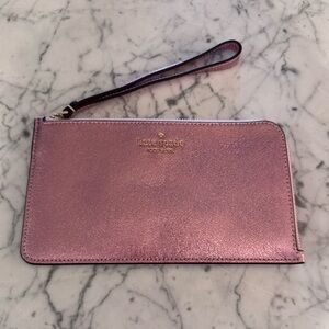 Kate spade Lucy medium zip wristlet, new condition. Pink! 8x4 1/2.